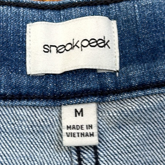 Sneak Peek denim raw hem mini skirt. Button front.  Front pockets. Medium. - Picture 2 of 11